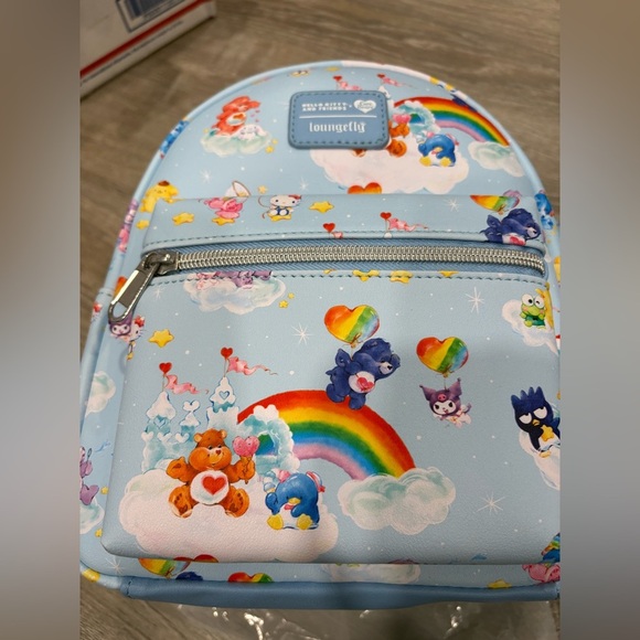 Loungefly Handbags - Loungefly Blue Backpack with CareBears Design